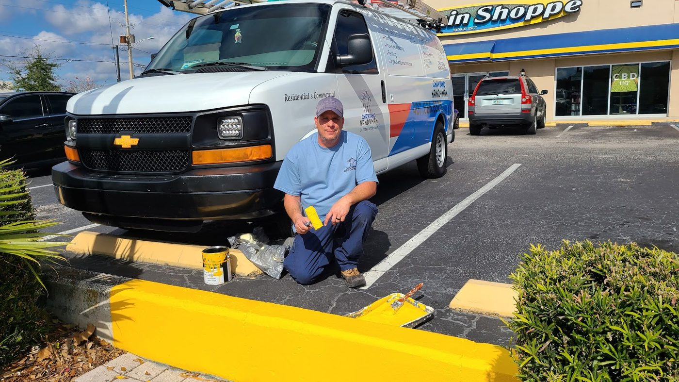 Raul of Chaviano Handyman with his service van in Orlando, Florida