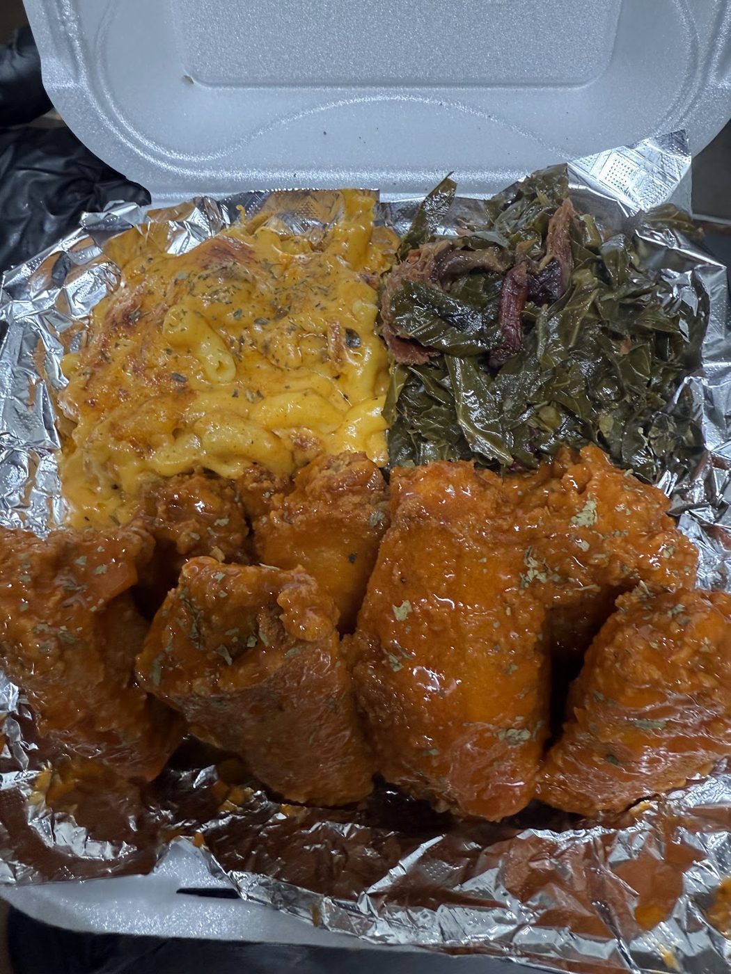 Saucy wings with mac & cheese and collard greens