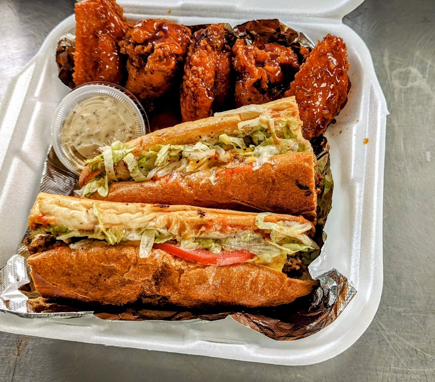 Chopped cheese sub with glazed wings