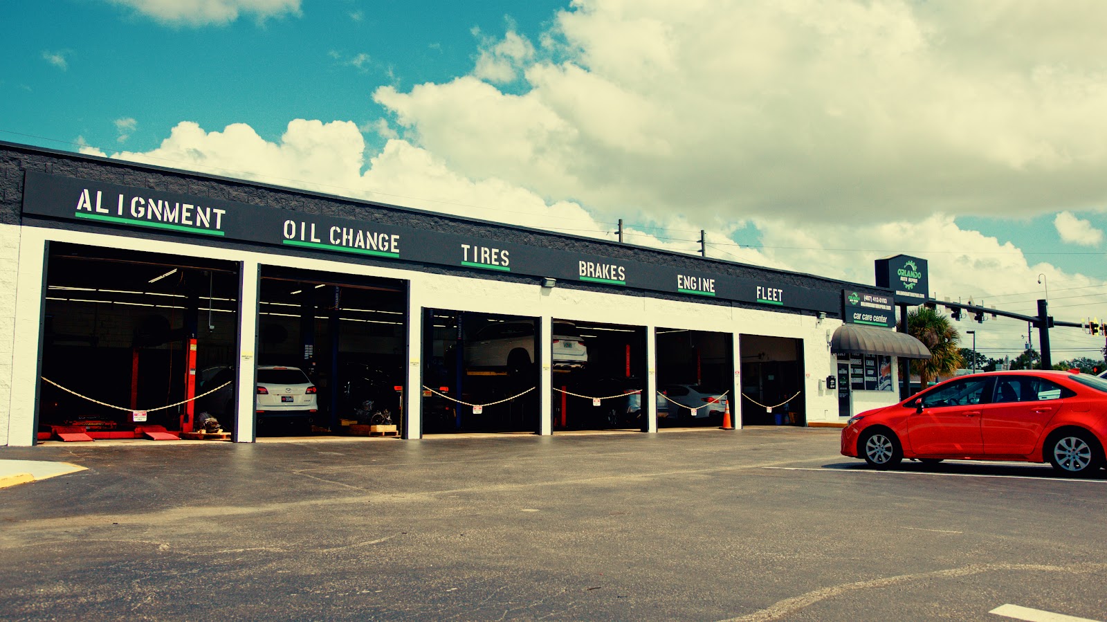 Orlando repairing a vehicle in an Orlando driveway