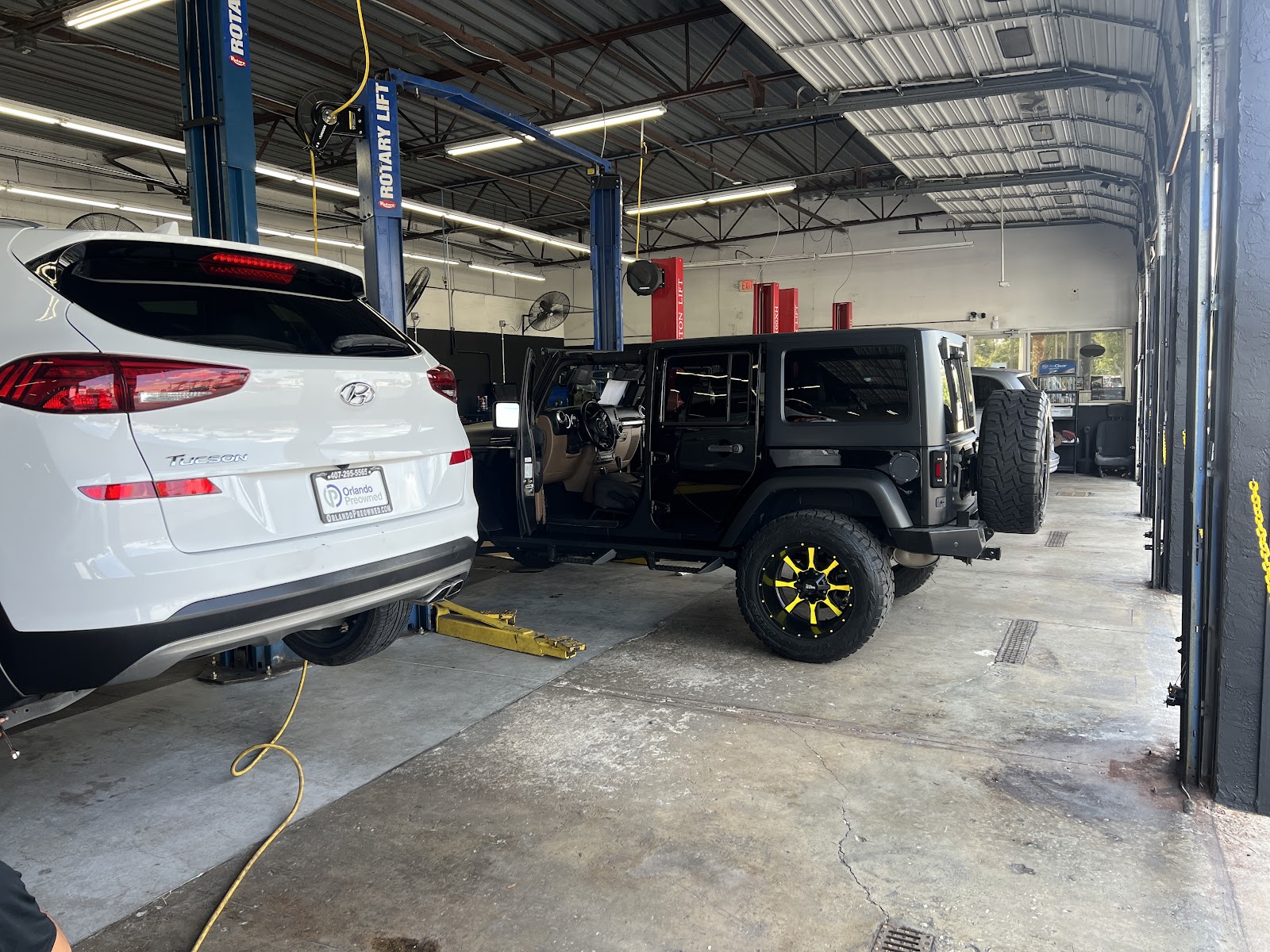 Orlando working under the hood at a customer's home