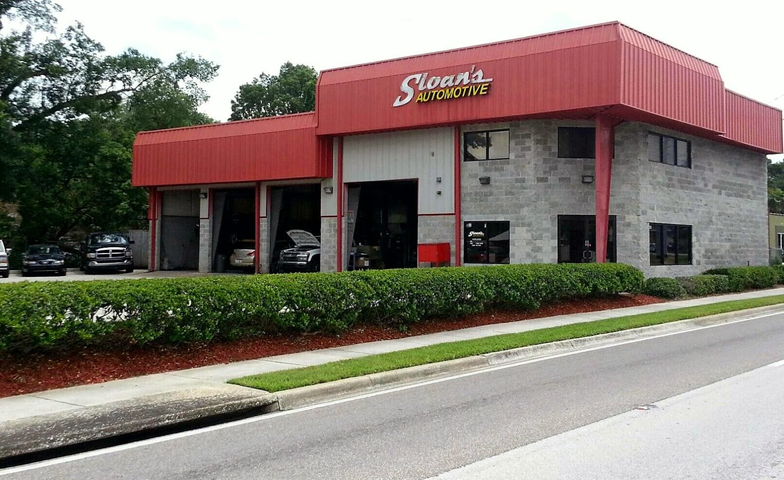Sloan's repairing a vehicle in an Orlando driveway